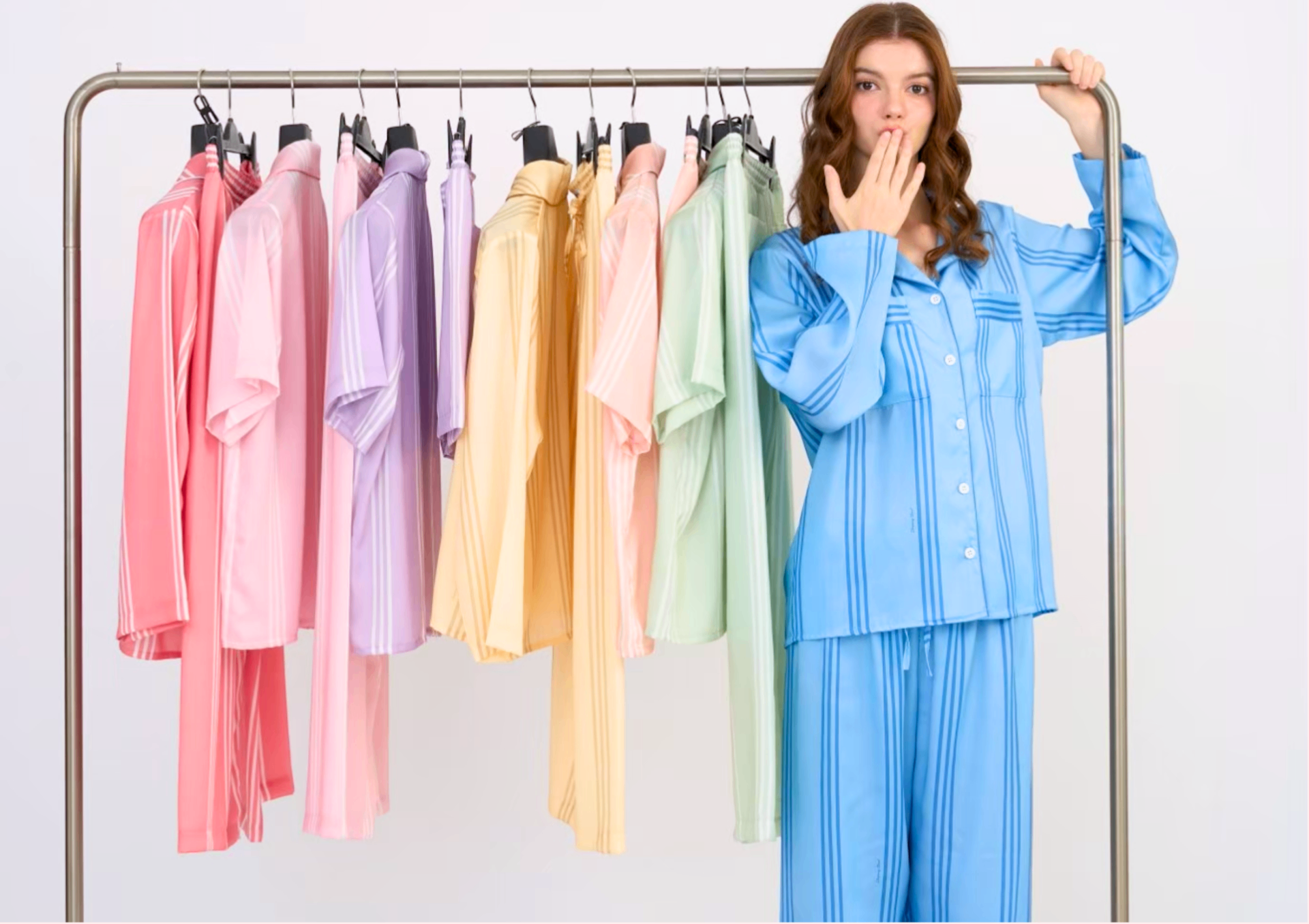 Sleeping Cloud colorful pajama range hanging on a rack